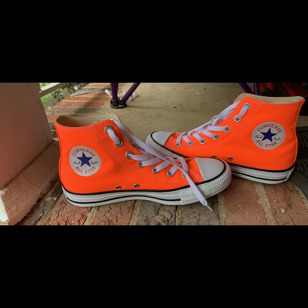 Neon orange high top converse